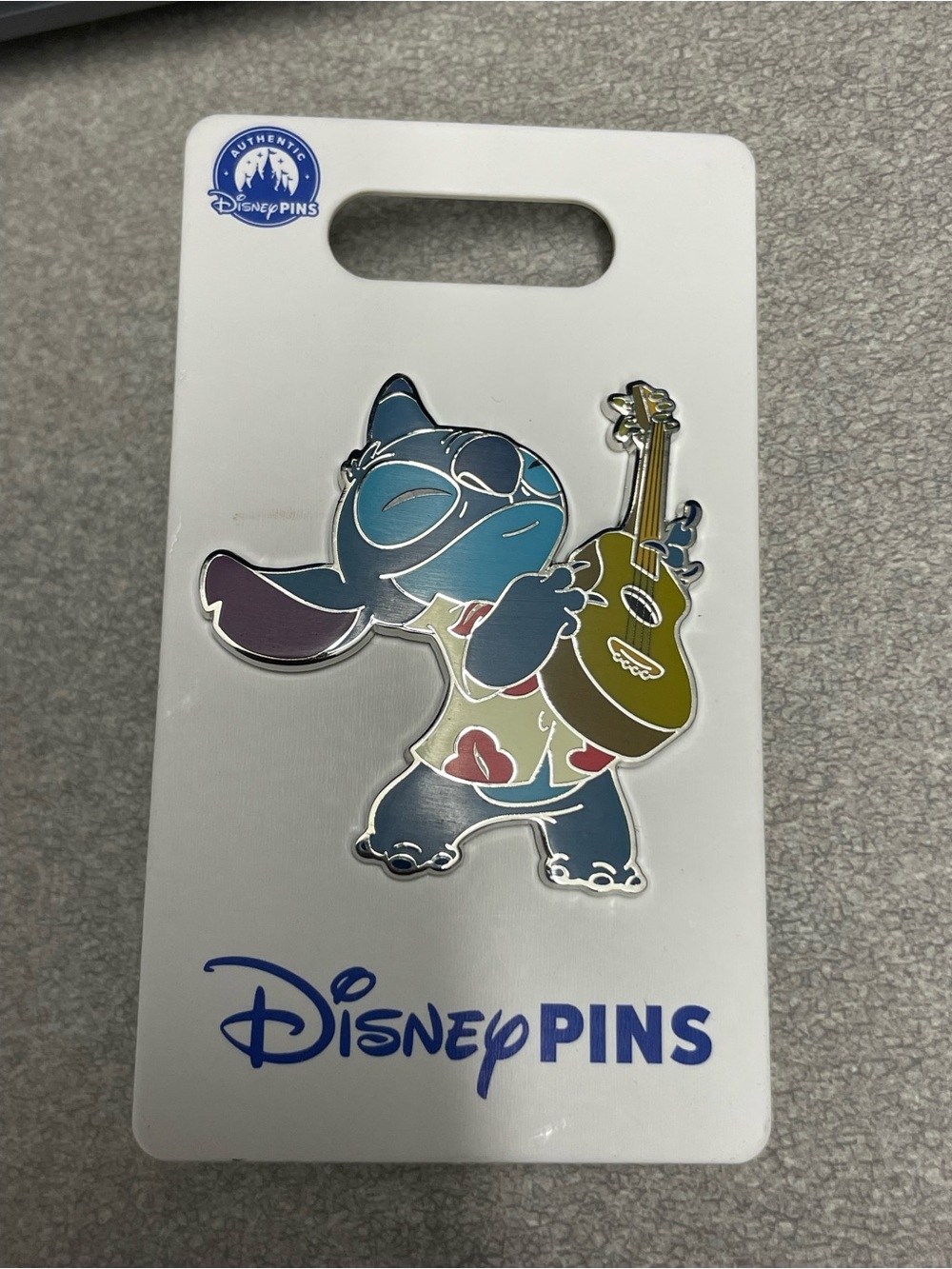 Stitch with ukulele pin